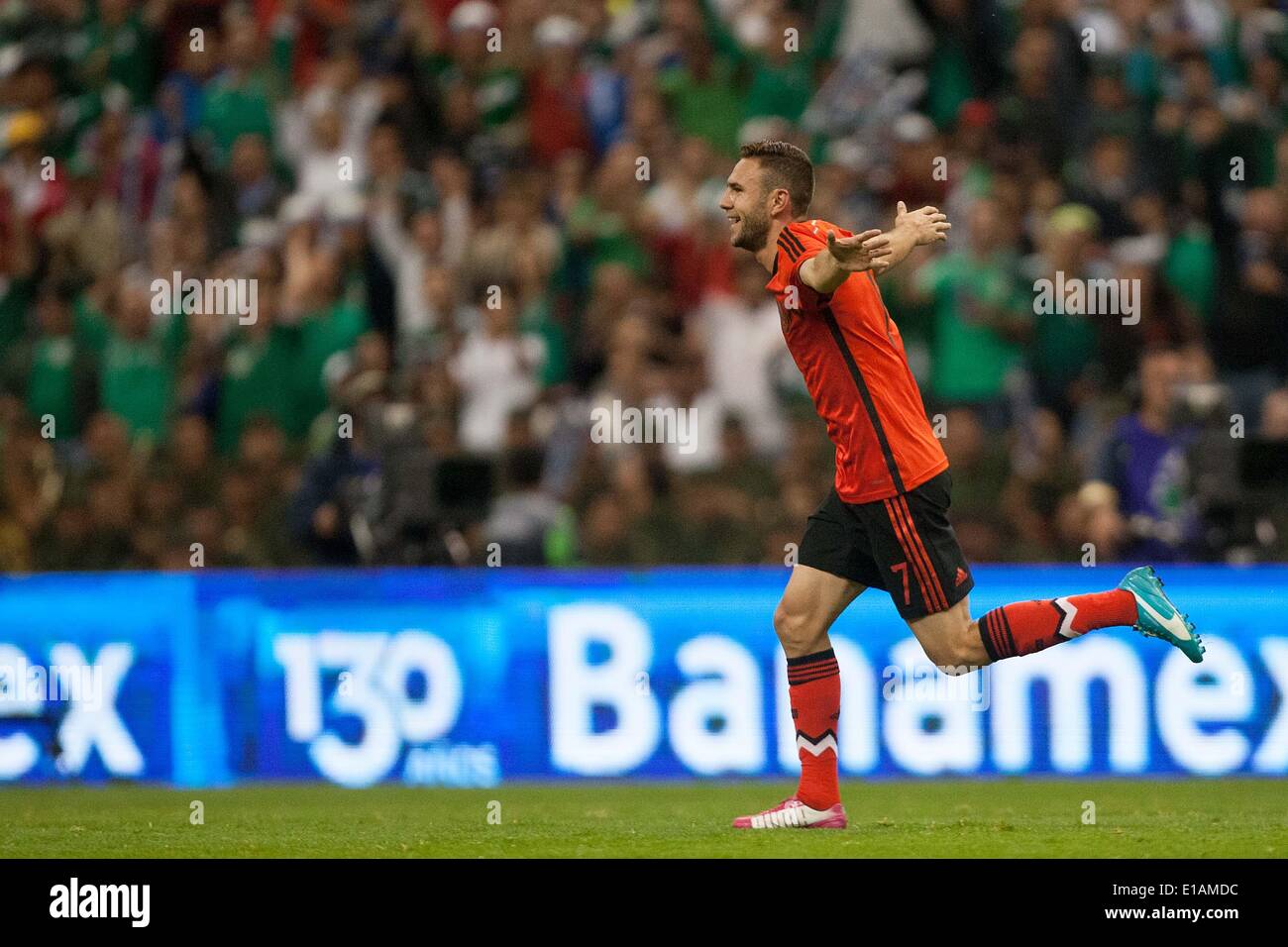 Mexico City, Mexico. 28th May, 2014. Miguel Layun from Mexico celebrates scoring during a friendly match against Israle at the Azteca Stadium in Mexico City, capital of Mexico, on May 28, 2014. Credit:  Pedro Mera/Xinhua/Alamy Live News Stock Photo