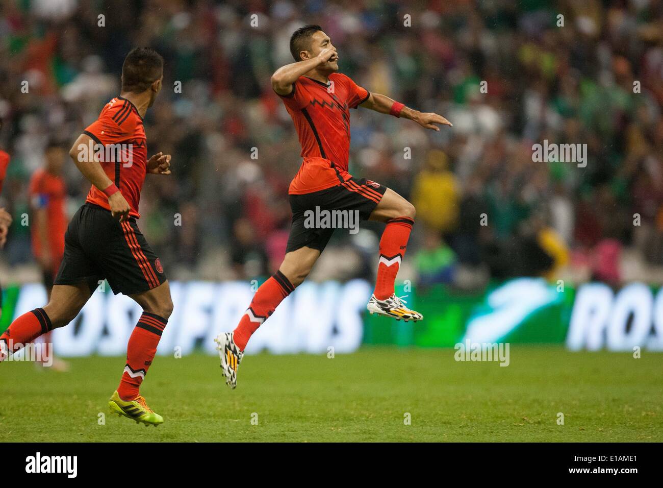 Mexico City, Mexico. 28th May, 2014. Marco Fabian (R) from Mexico celebrates scoring during a friendly match against Israel at the Azteca Stadium in Mexico City, capital of Mexico, on May 28, 2014. Credit:  David de la Paz/Xinhua/Alamy Live News Stock Photo