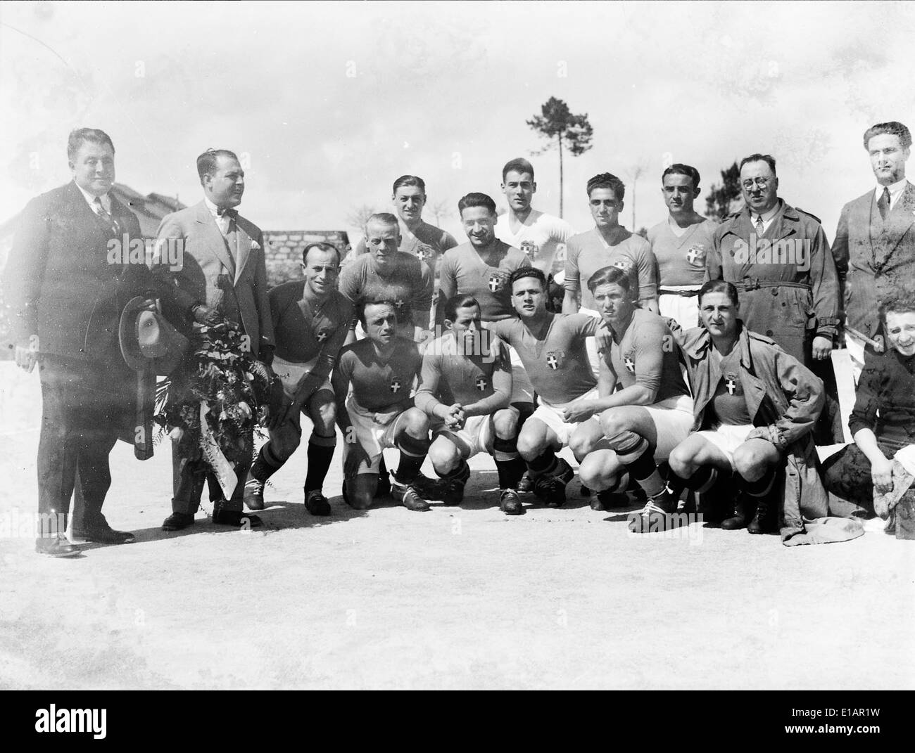 A historical photograph of the football match between Portugal and Italy in Porto, Portugal, in 1928, showcasing the teams in action. Stock Photo