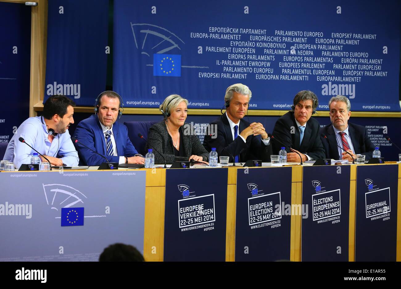 Brussels, Belgium, 28th May, 2014. Marine Le Pen (3rd L), leader of the far-right National Front (NF), attends a press conference at the headquarters of European Union, in Brussels, on May 28, 2014. During the press conference, Le Pen announced a right-wing alliance between the NF and the Northern League (Italy), the Party of Freedom (Netherlands), the Freedom Party of Austria and the Vlaams Belang (Belgium). This alliance is one step for the forming a parliamentary group, but has to meet the criterion that their elected are from at least seven countries.  Credit:  Gong Bing/Xinhua/Alamy Live  Stock Photo
