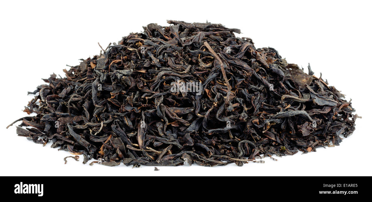 dry black tea leaves isolated on white Stock Photo Alamy