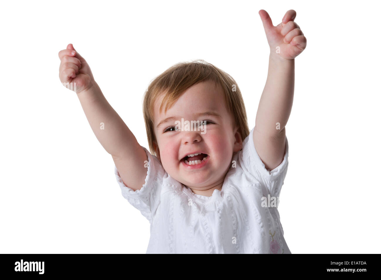Portrait of a happy little girl with hands up Stock Photo - Alamy