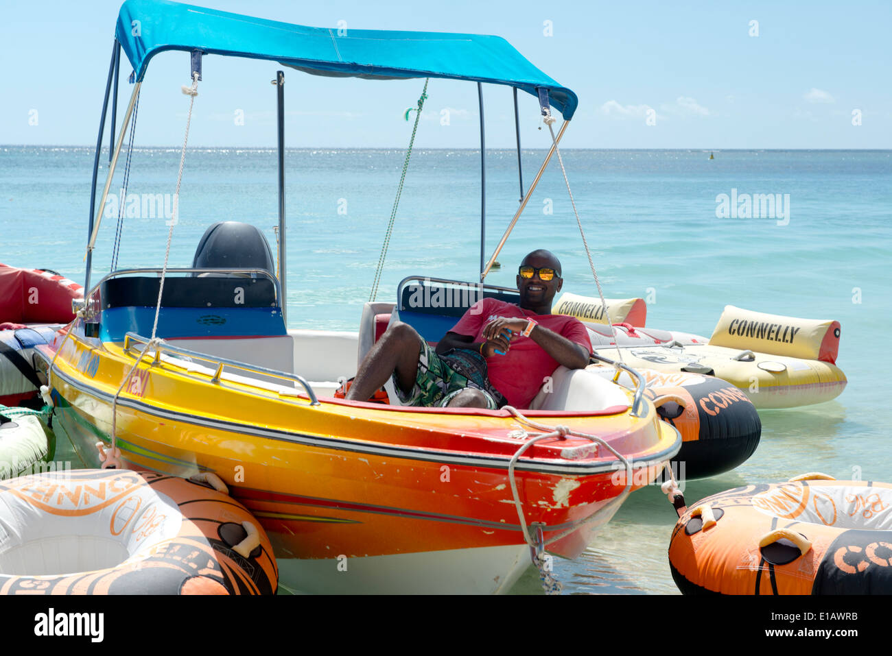 A speed boat operator at Troux au Biches, Mauritius, The Indian Ocean Stock Photo