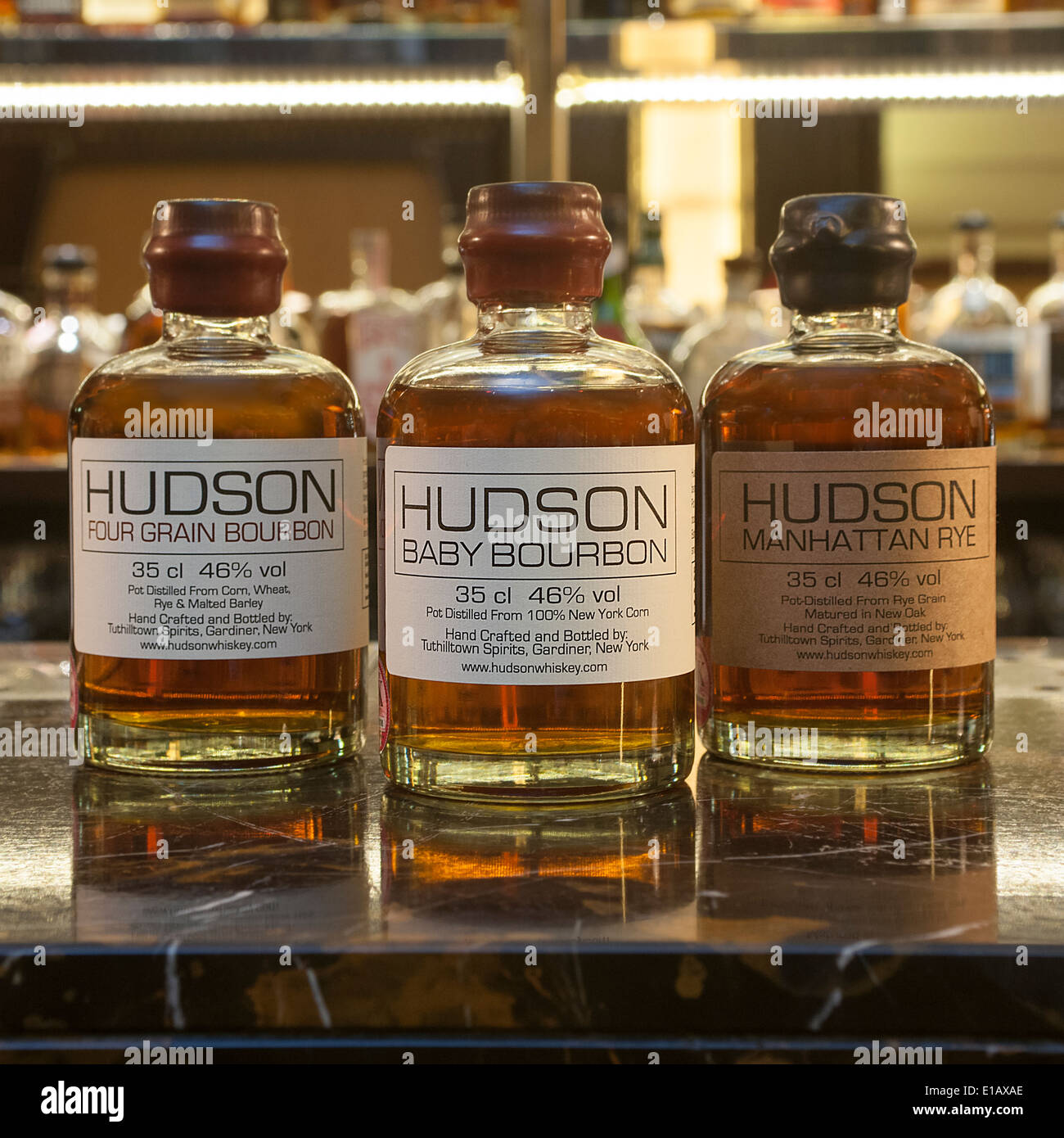 three bottles of Hudson Bourbon on a bar Stock Photo