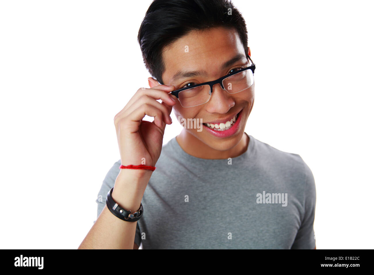 Portrait of a smiling asian man over white background Stock Photo
