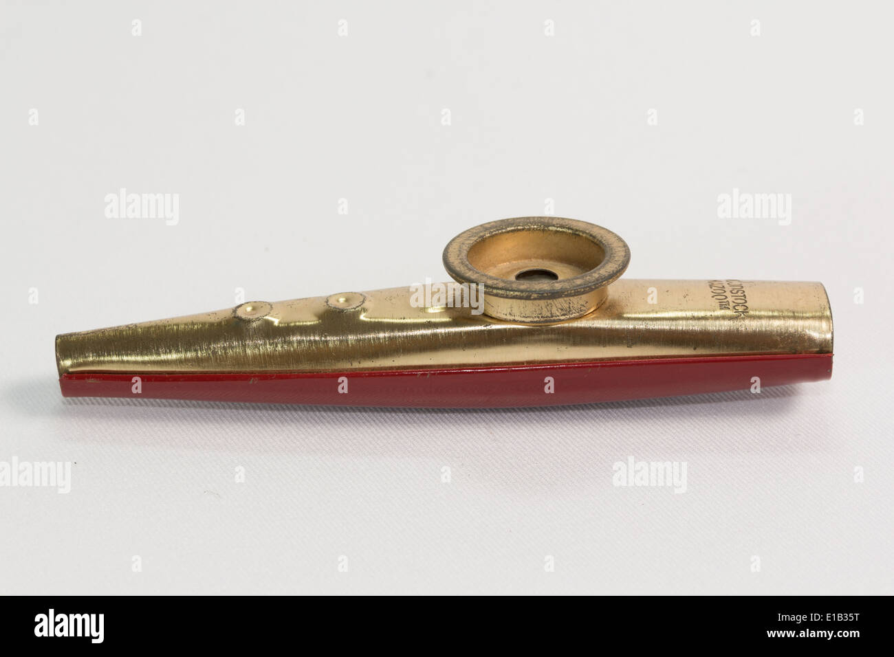 Red kazoo, plastic traditional musical instrument object isolated on white,  cut out, closeup. Kids unique wind instruments with vibrating membrane  Stock Photo - Alamy