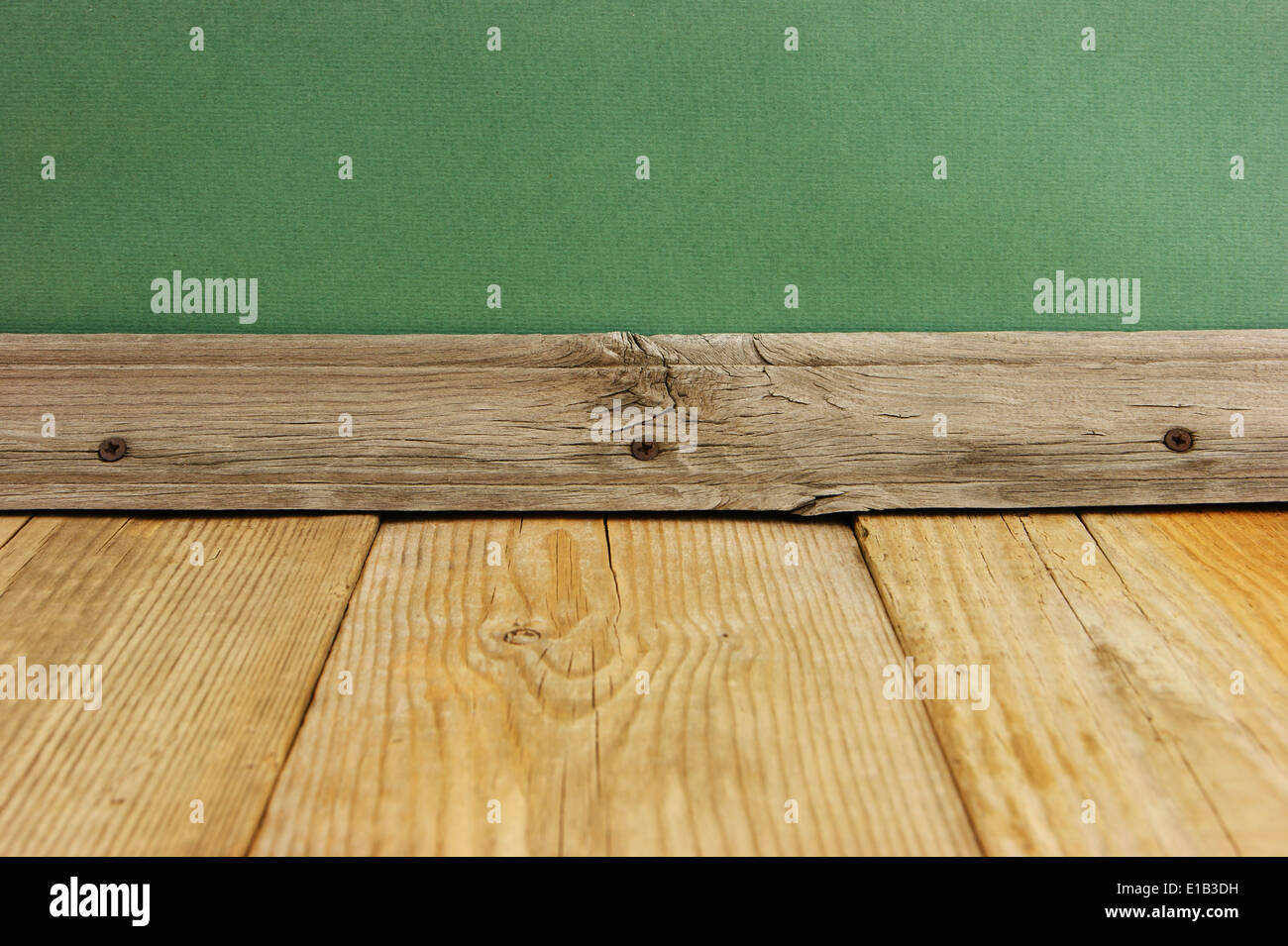 vintage wooden floor with green wall Stock Photo