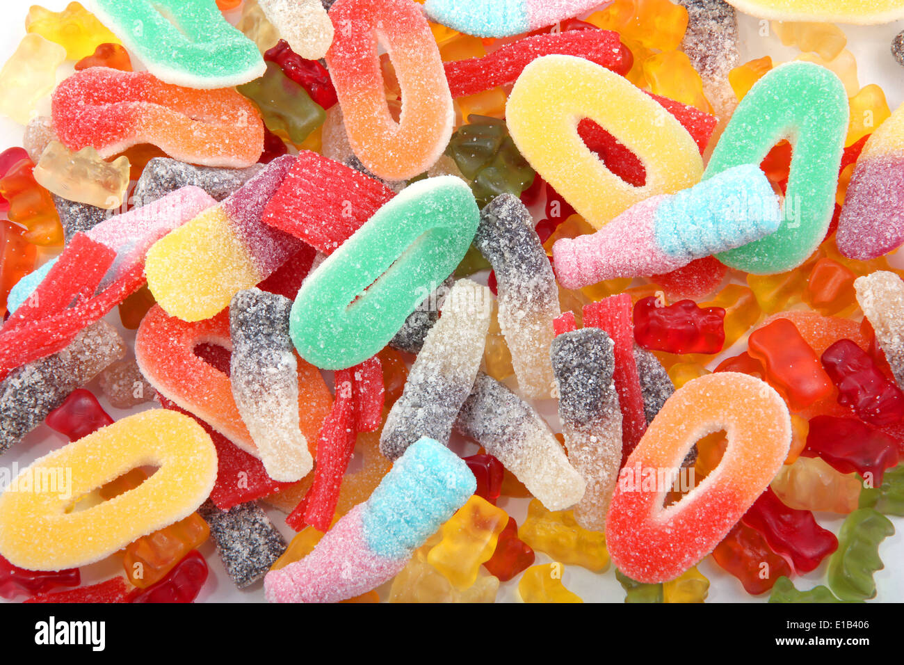 Kids gummy candies or sweeties in multi colors and a variety of shapes. Stock Photo