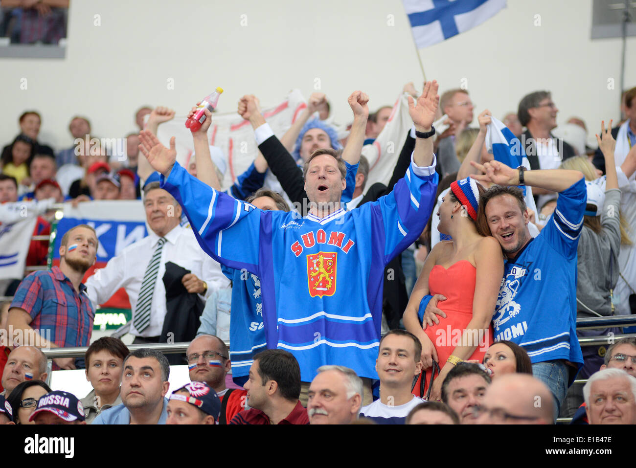 Fans of Finland celebrates during 2014 IIHF World Ice Hockey Championship final at Minsk Arena Stock Photo