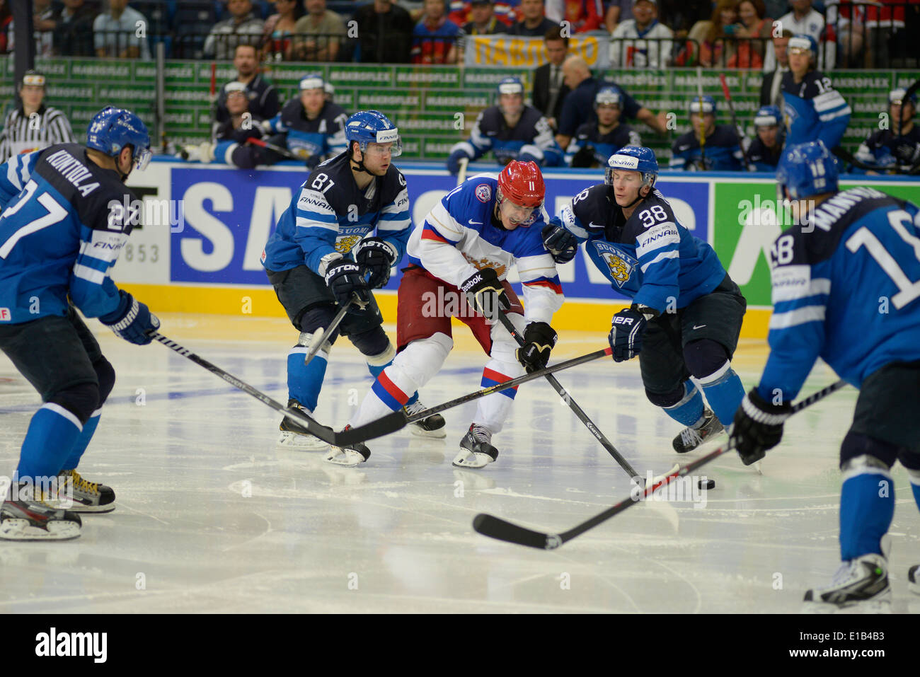 MALKIN Yevgeni of Russia and HIETANEN Juuso of Finland battle for puck during 2014 IIHF World Ice Hockey Championship final Stock Photo
