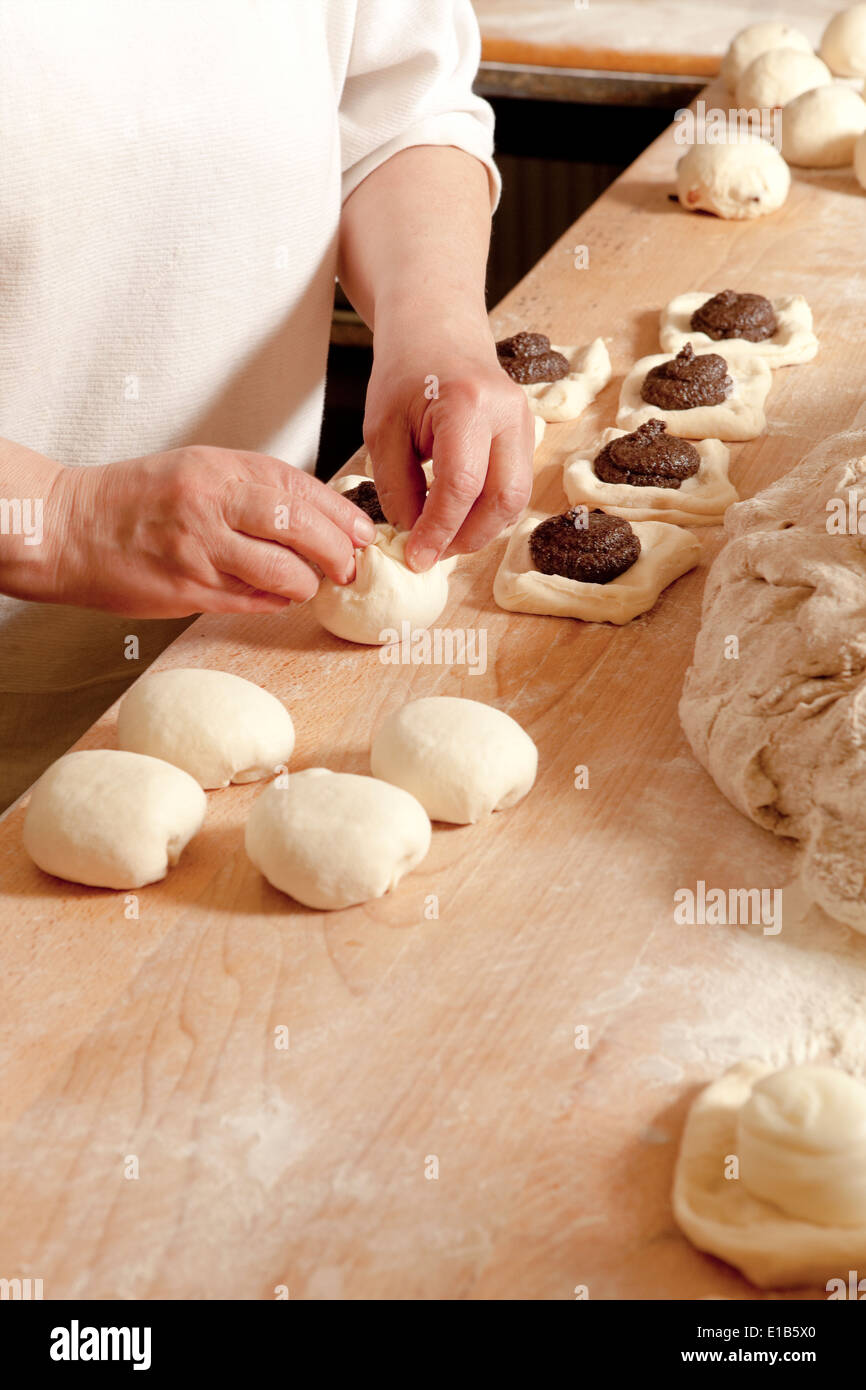 Professional Bakery - Baker Making Sweet Pastry Stock Photo - Alamy