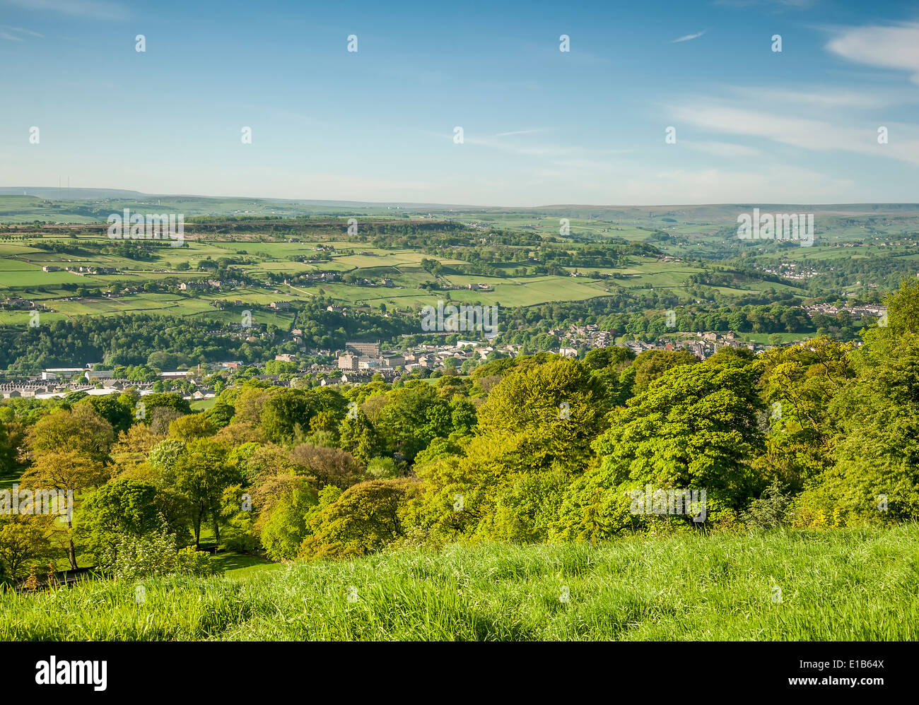 Sunny Spring day looking across the green valleys of Calderdale in West Yorkshire Stock Photo
