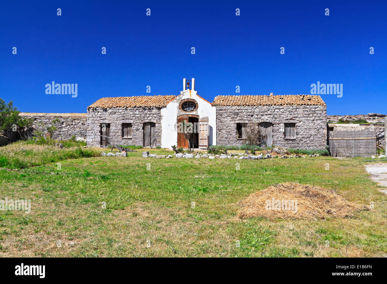 ancient small chapel in San Pietro island, Sardinia, Italy Stock Photo