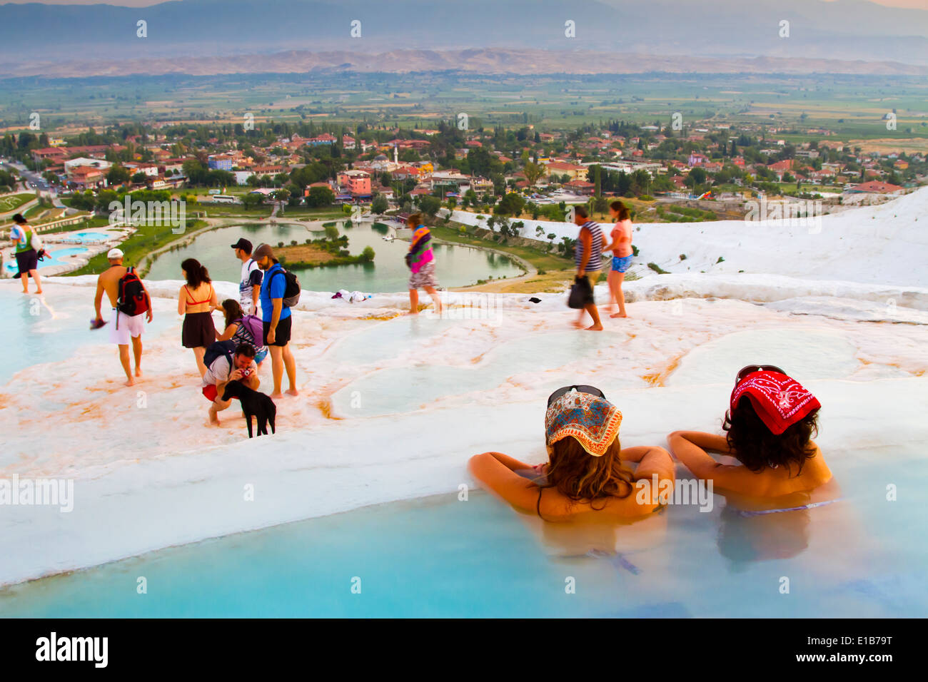 Travertine terrace formations and tourists. Pamukkale. Denizli province. Anatolia, Turkey. Stock Photo