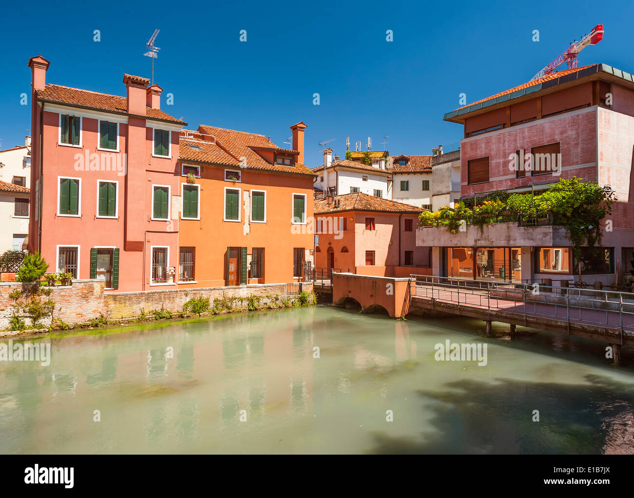 Colourful riverside buildings in Treviso, Northern Italy Stock Photo