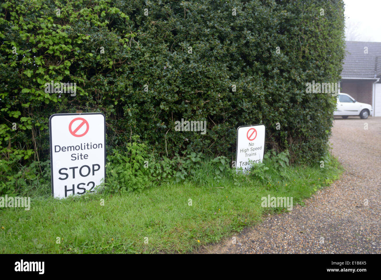 Protest signs at Sibley's Coppice Near Great Missenden on the line of the proposed HS2 rail route.  April 24th 2014 Stock Photo