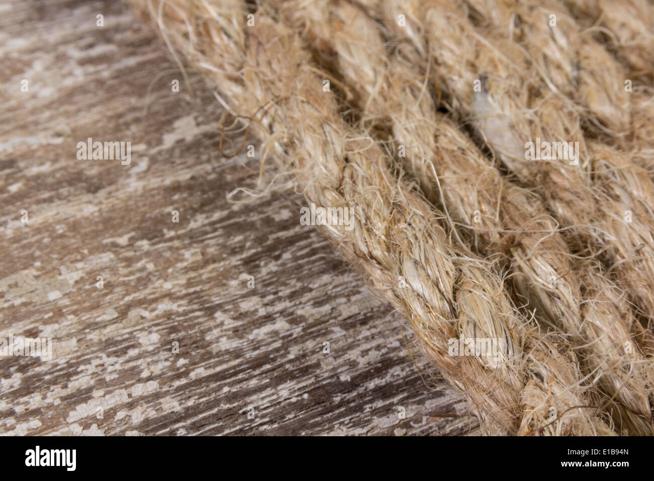 rope on wooden texture background Stock Photo - Alamy