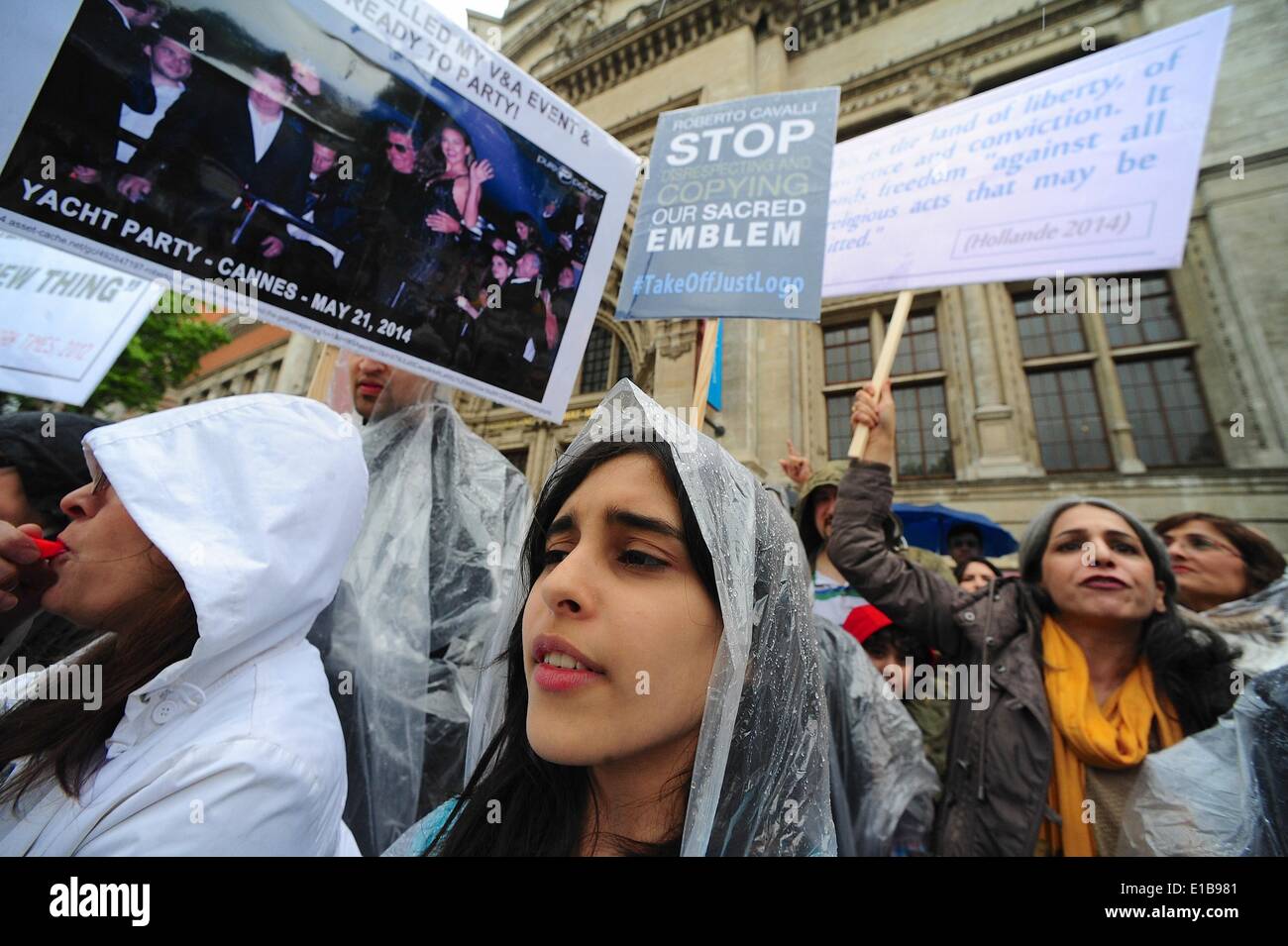 London, United KIngdom, UK. 29th May, 2014. Sufi students and their supporters protested in front of The Victoria and Albert Museum where the designer had planned to give a talk about fashion but cancelled. The group claim that Cavalli has replicated their ancient sacred Sufi symbol in his perfume logo ''Just Cavalli'' and want the symbol removed from the campaign. Credit:  Gail Orenstein/ZUMAPRESS.com/Alamy Live News Stock Photo