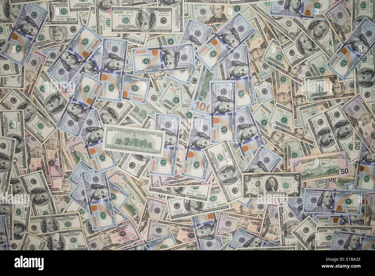 Multiple scattered American 100 dollar banknotes in full frame coverage ...