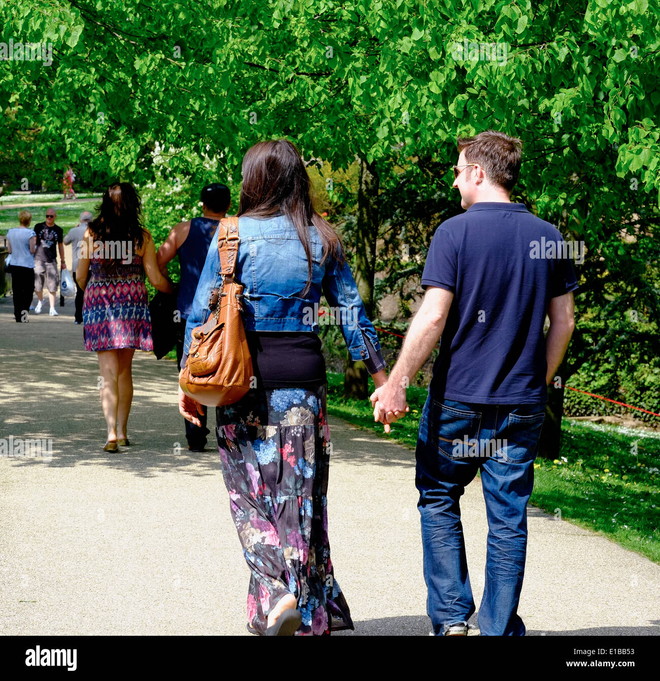 Old couple walking hand in hand hi-res stock photography and images - Alamy
