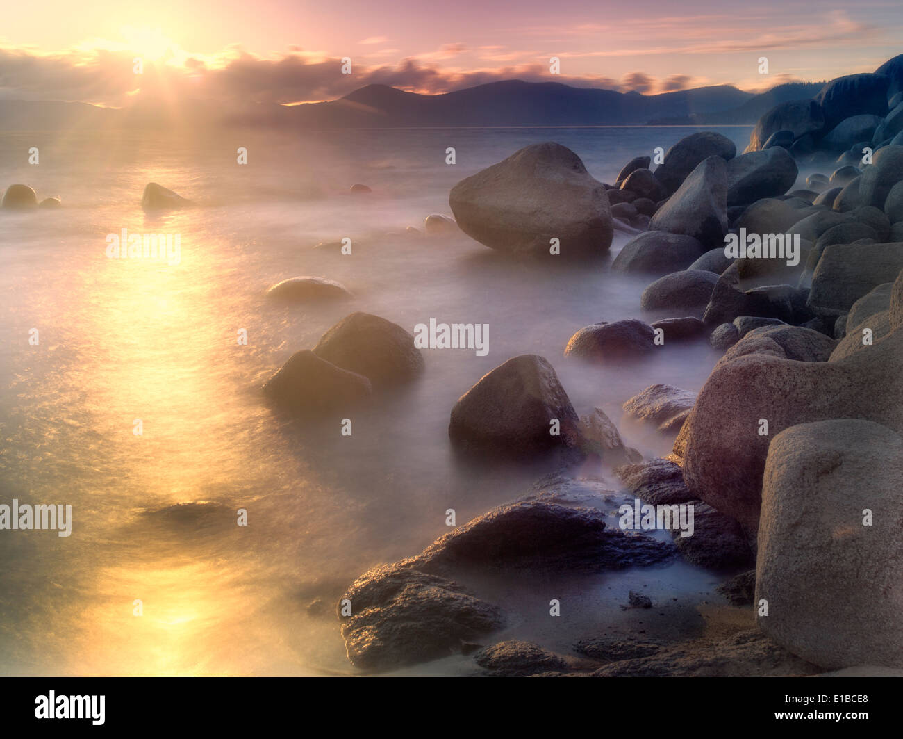 Sunset and rocks on Lake Tahoe. Sand Harbor State Park, Nevada Stock Photo
