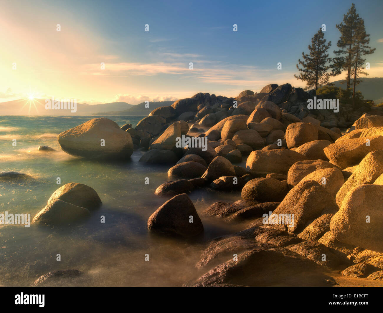 Sunset and rocks on Lake Tahoe. Sand Harbor State Park, Nevada Stock Photo