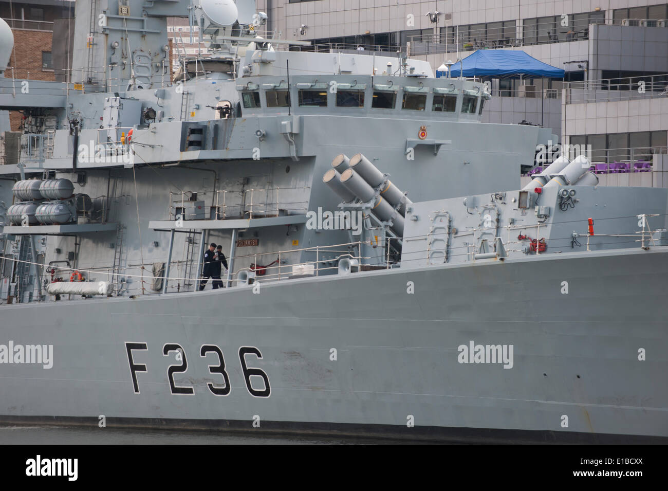 West India Dock, Isle of Dogs, London UK. 29th May 2014. HMS Montrose, Type 23 Duke class Frigate, berths among the offices of Canary Wharf in London as part of the 350th Anniversary of the Royal Marines. Montrose is normally based in Devonport. Credit: Malcolm Park editorial/Alamy Live News Stock Photo