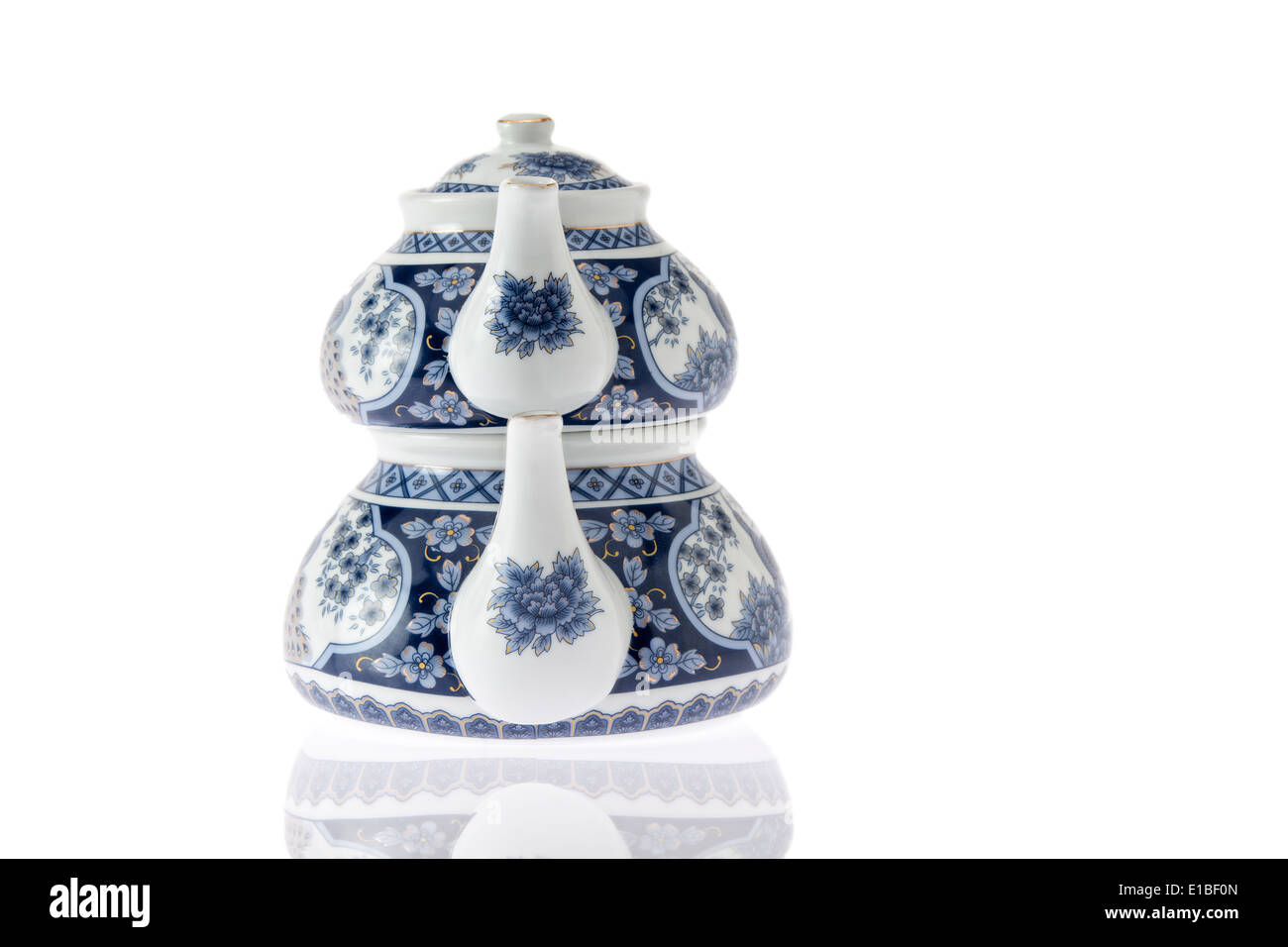 Antique blue and white Turkish teapot with the traditional double