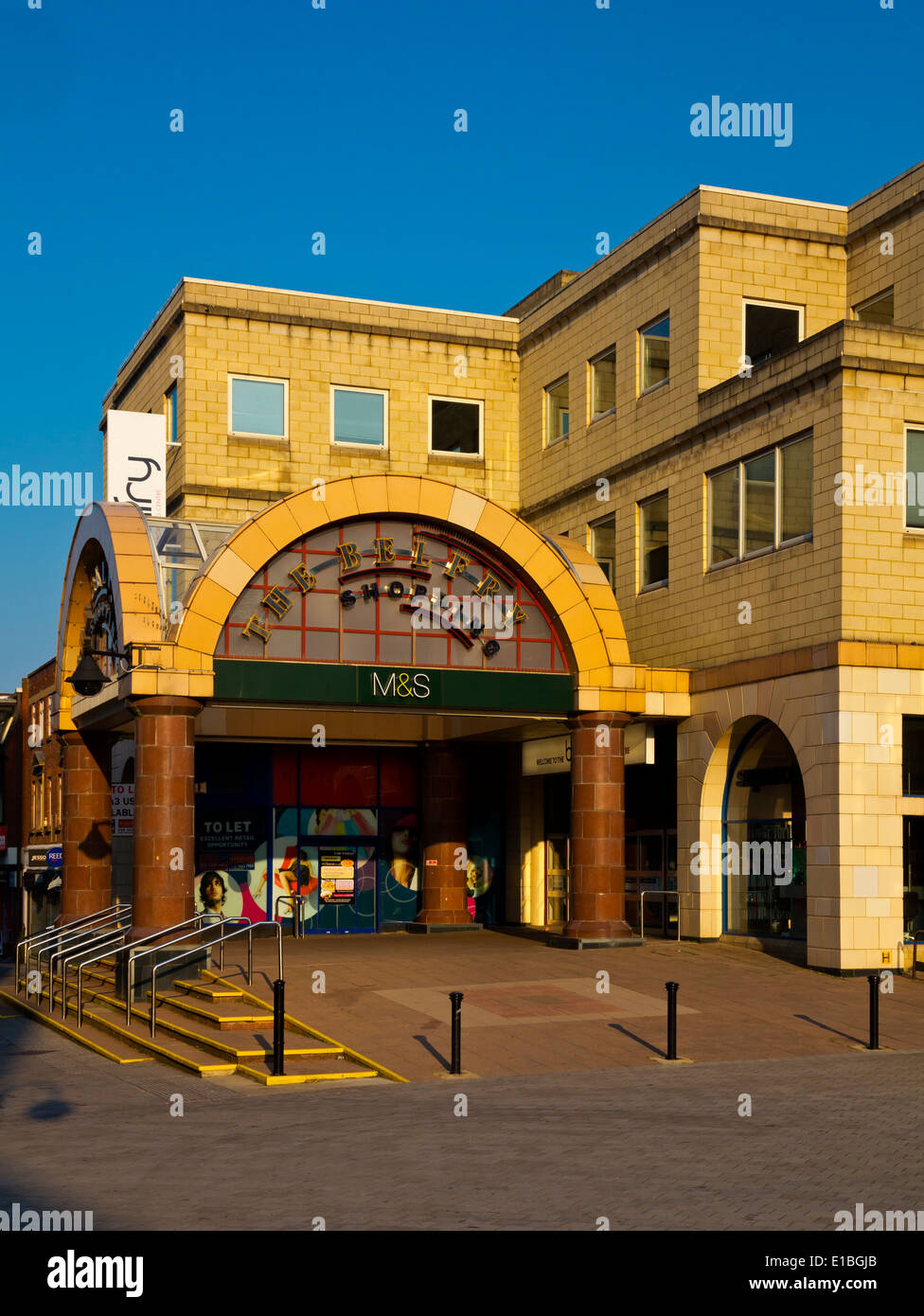 The Belfry Shopping Centre in Redhill Surrey England UK a pedestrianised area on the High Street with M&S in front of building Stock Photo