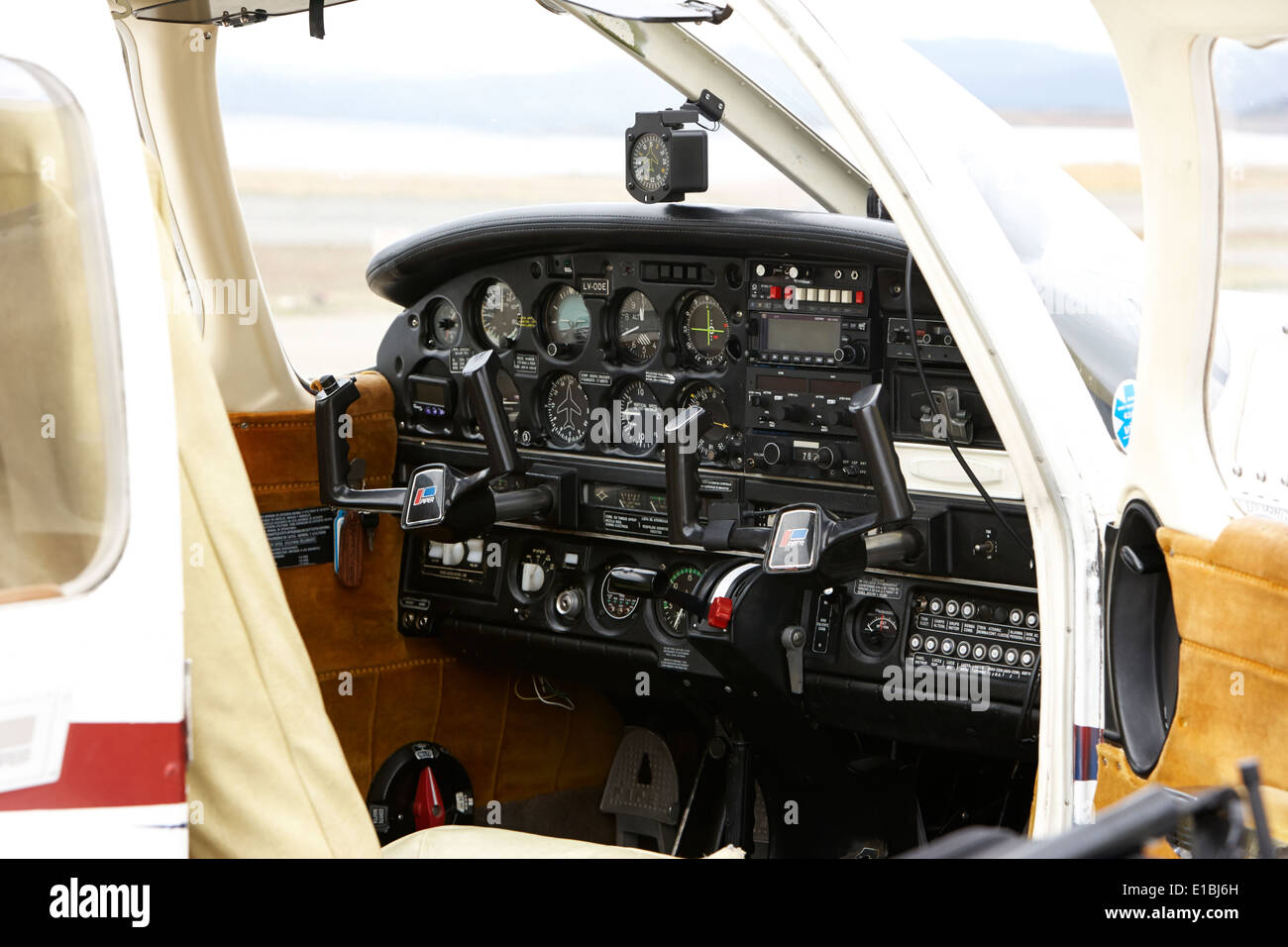 flight controls of a spanish language piper pa-28 archer light aircraft aeroclub Ushuaia Argentina Stock Photo