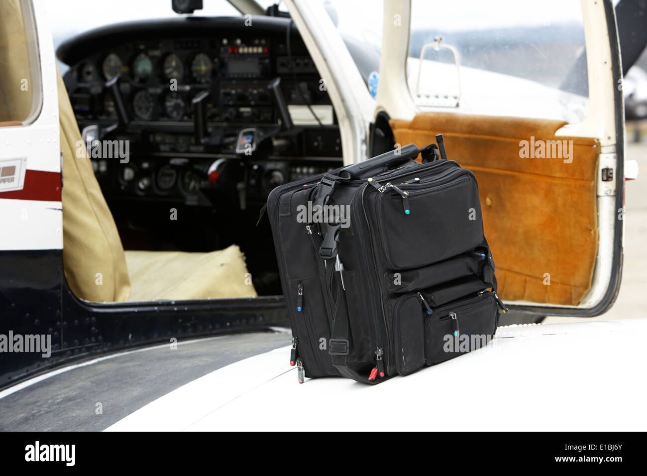 flight ready bag and piper pa-28 archer light aircraft aeroclub Ushuaia Argentina Stock Photo