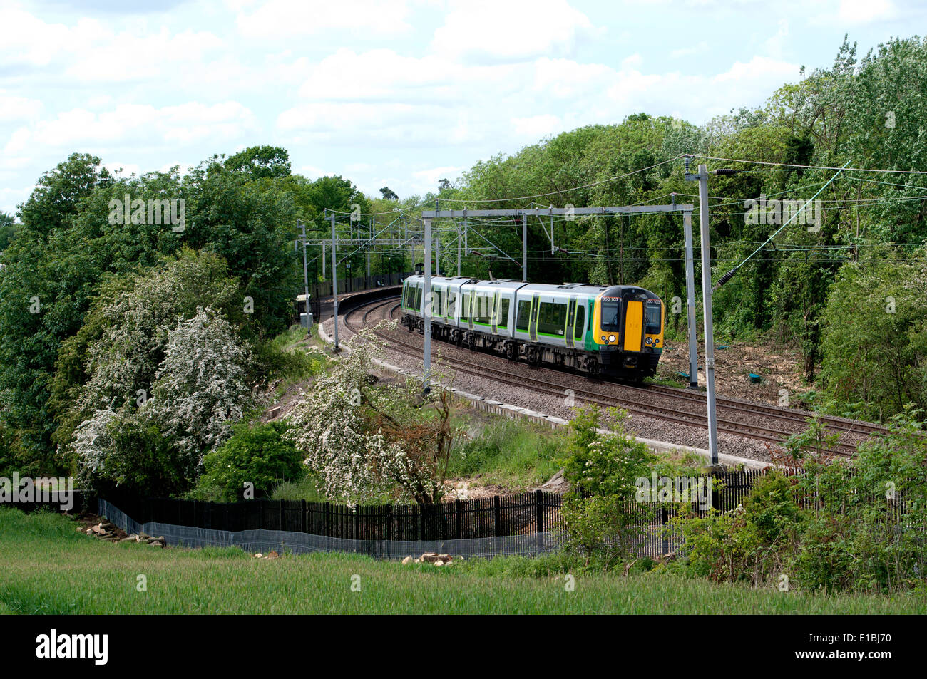 London Midland electric train leaving Long Buckby station