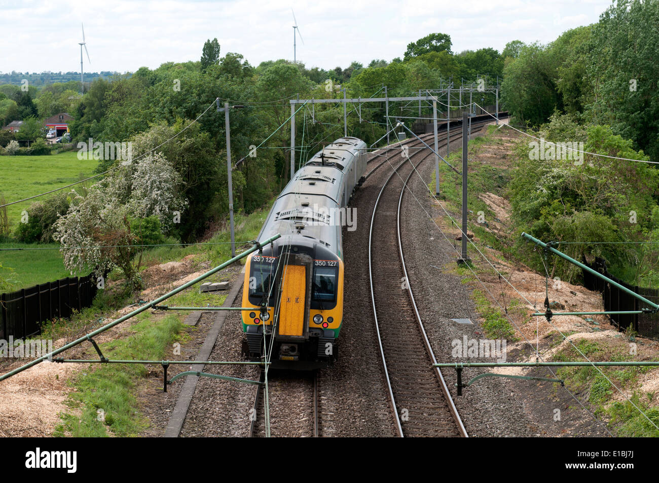 London Midland electric train approaching Long Buckby station