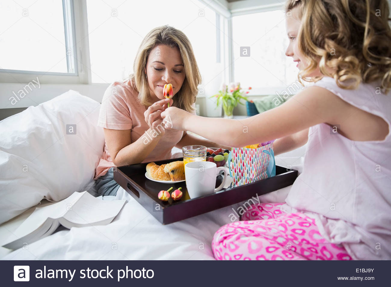 Daughter bringing breakfast mother in hi-res stock photography and ...