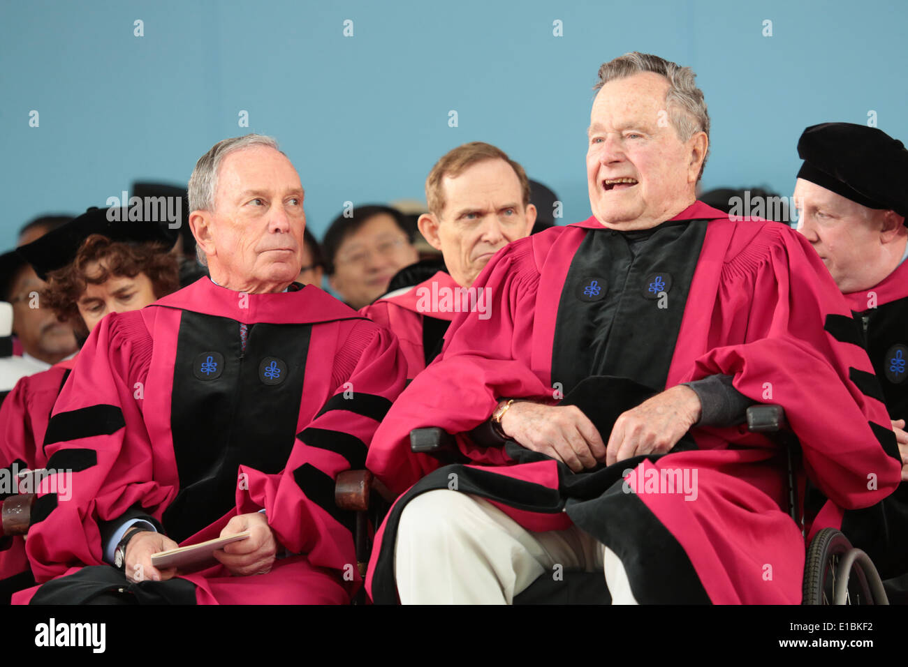 Cambridge, Massachusetts, USA. 29th May, 2014. Former President George H. W. Bush, right, and former New York City Mayor Michael Bloomberg, left, receive honorary degrees during Harvard University's 363rd commencement ceremony in Cambridge, Massachusetts. Credit:  Nicolaus Czarnecki/METRO Boston/ZUMAPRESS.com/Alamy Live News Stock Photo