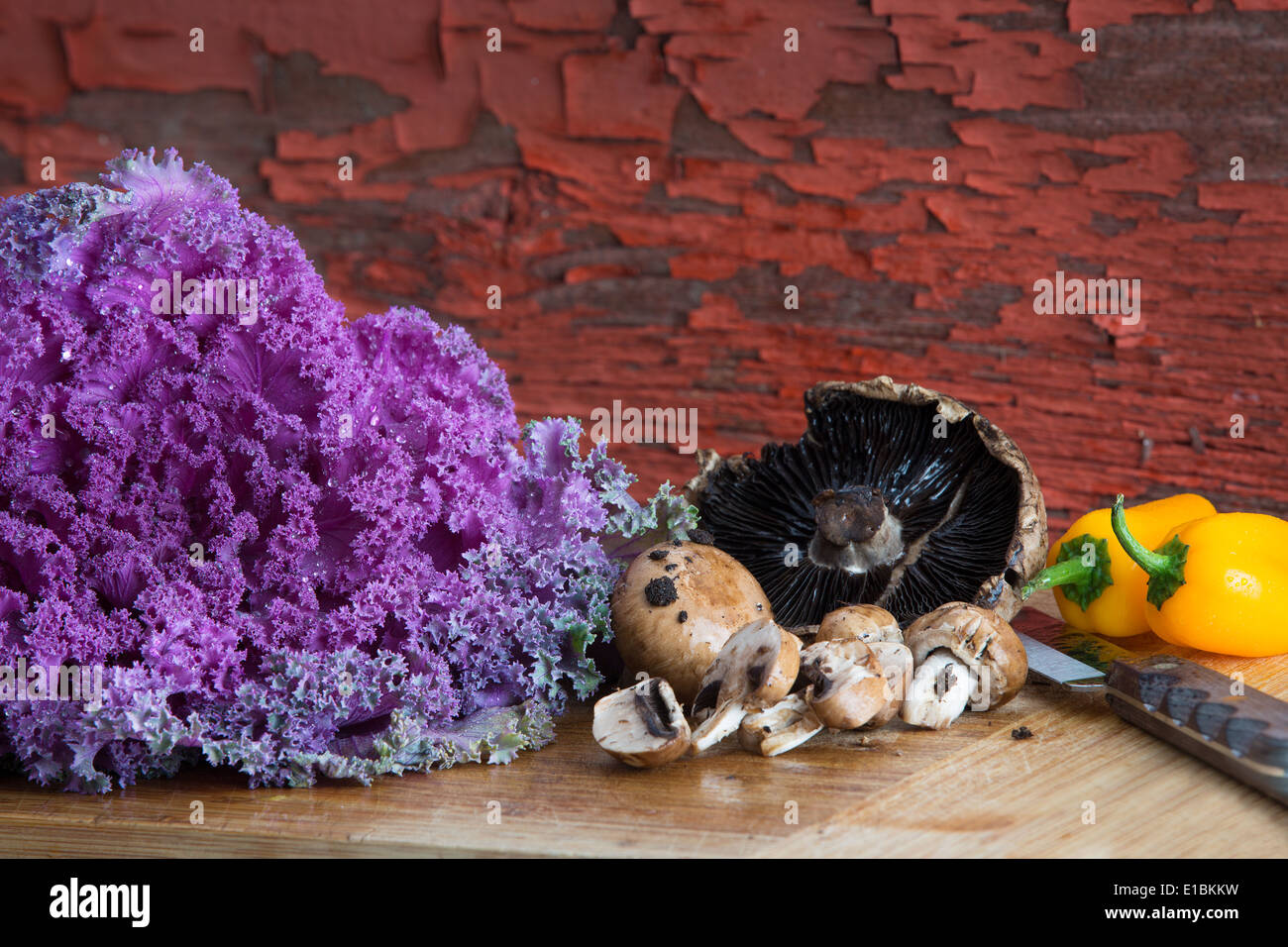Fresh healthy cooking ingredients with a head of purple curlyleaf kale