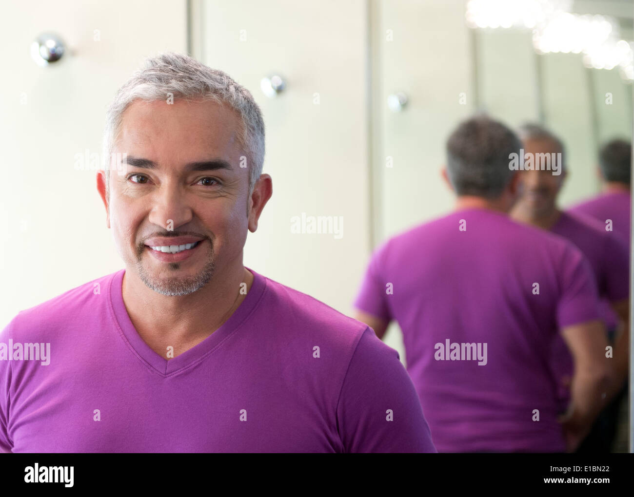 Berlin, Germany. 21st May, 2014. US gog trainer Cesar Millan poses at