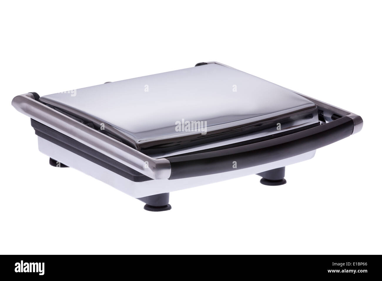 Modern electric panini sandwich maker with the lid closed viewed at an