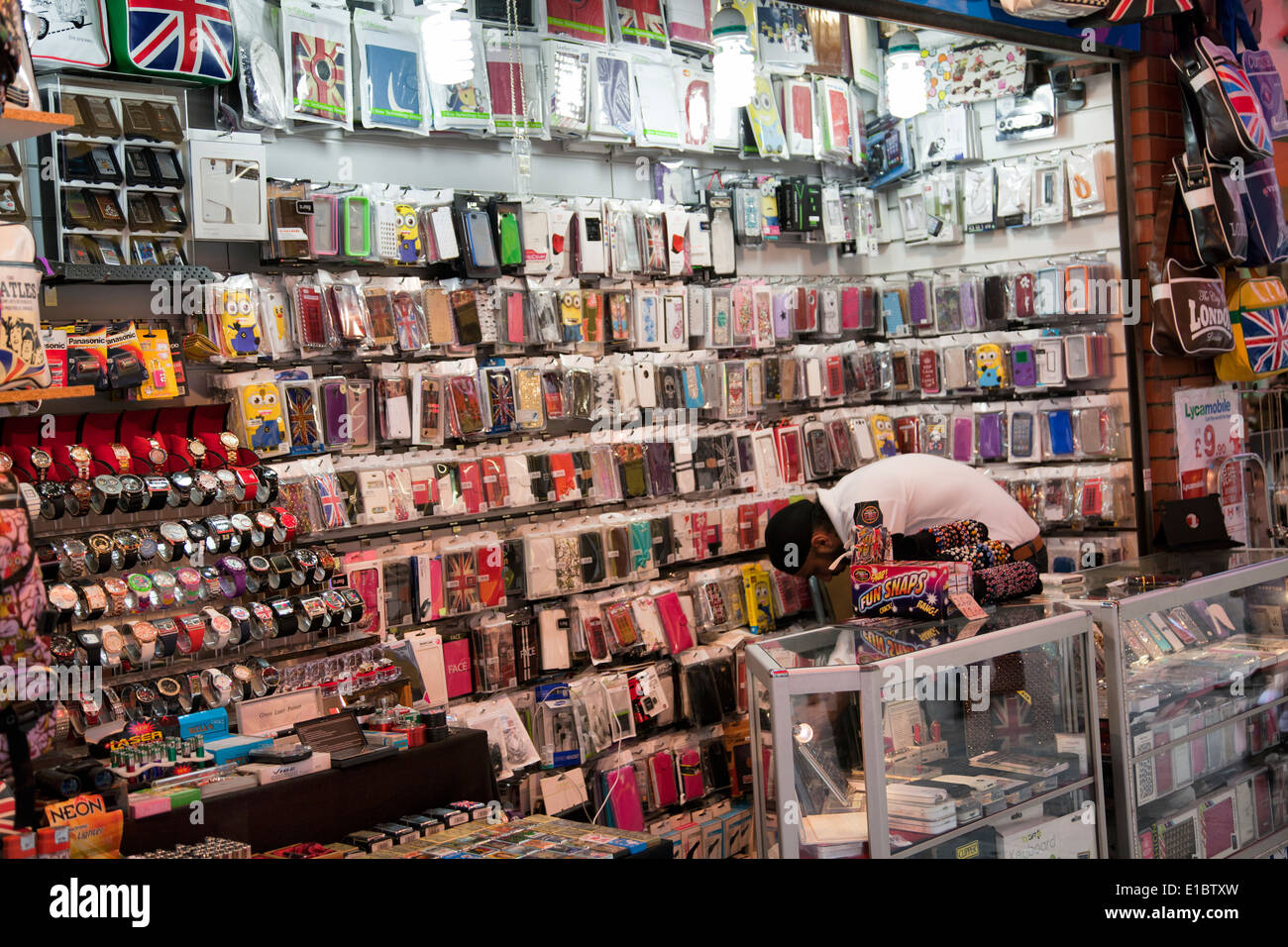 Vendor of Mobile Phone Accessories Merchandise on Newport Crt in london Soho UK Stock Photo Alamy