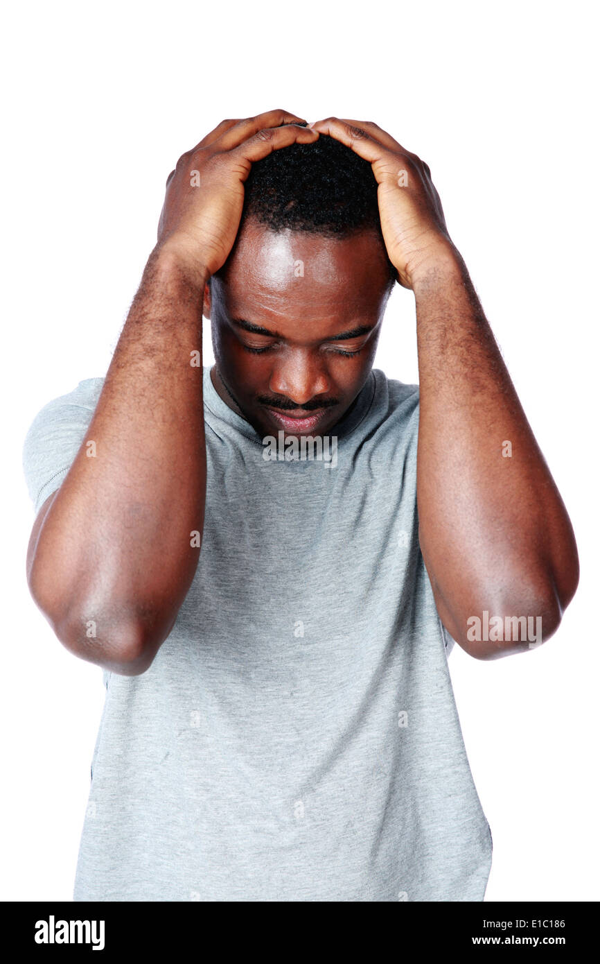 African man having headache isolated on white background Stock Photo