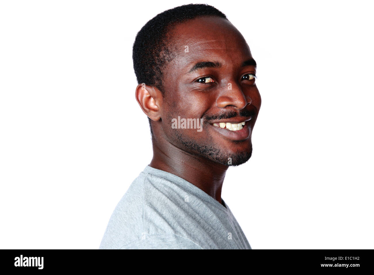side view of stylish man in suit standing with hands in pockets and looking  away isolated on grey Stock Photo - Alamy