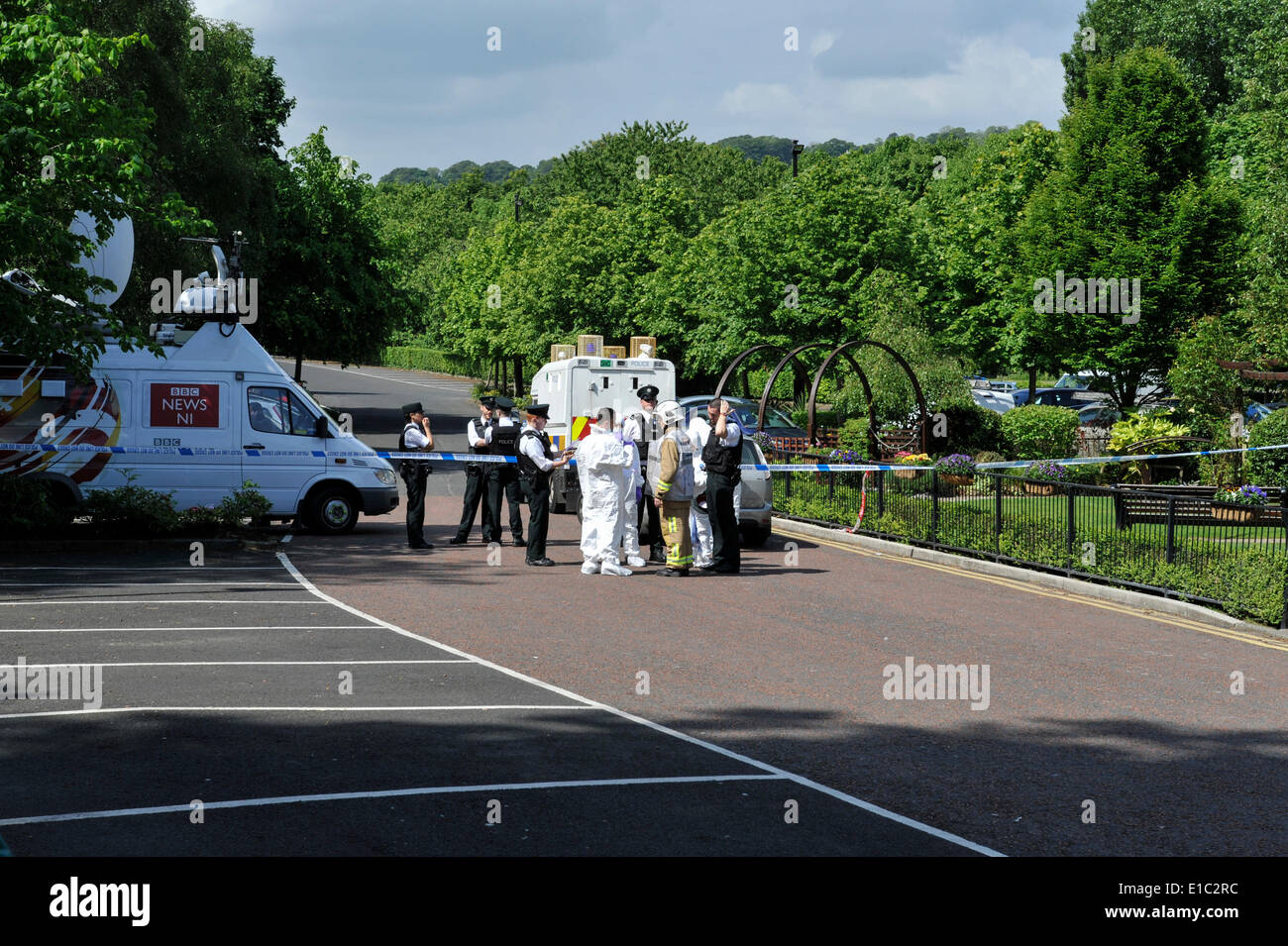 Derry, Londonderry, Northern Ireland. 30th May, 2014. Forensic Officers at the scene of a firebomb attack in the reception area of a Londonderry hotel. The Everglades Hotel, in the Prehen area of the city, was evacuated after the device was reported at 23:15 BST on Thursday. The device exploded a short time later when Army bomb experts were working to make it safe. Credit:  George Sweeney/Alamy Live News Stock Photo