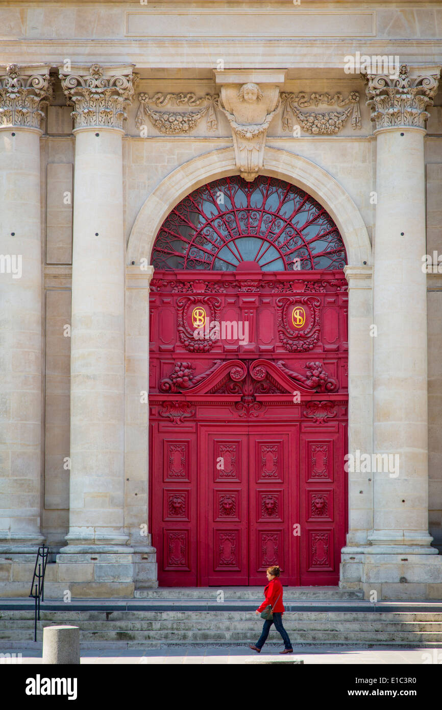 Woman Walks Past The Front Doors To Saint Paul Saint Louis