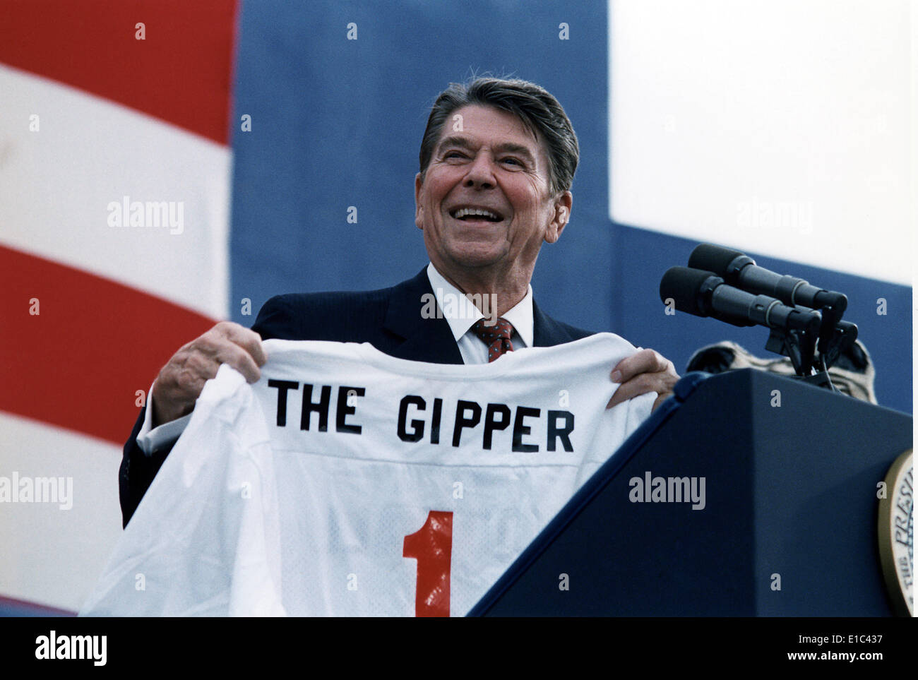 Ronald Reagan. President Reagan holding a 'Gipper' jersey at a Reagan-Bush Rally in New York, 1984 Stock Photo