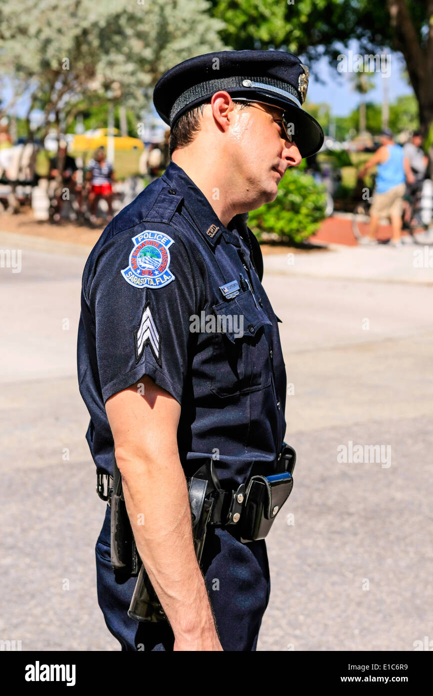 Police officer on duty in downtown Sarasota FL on a hot sprint day Stock  Photo - Alamy