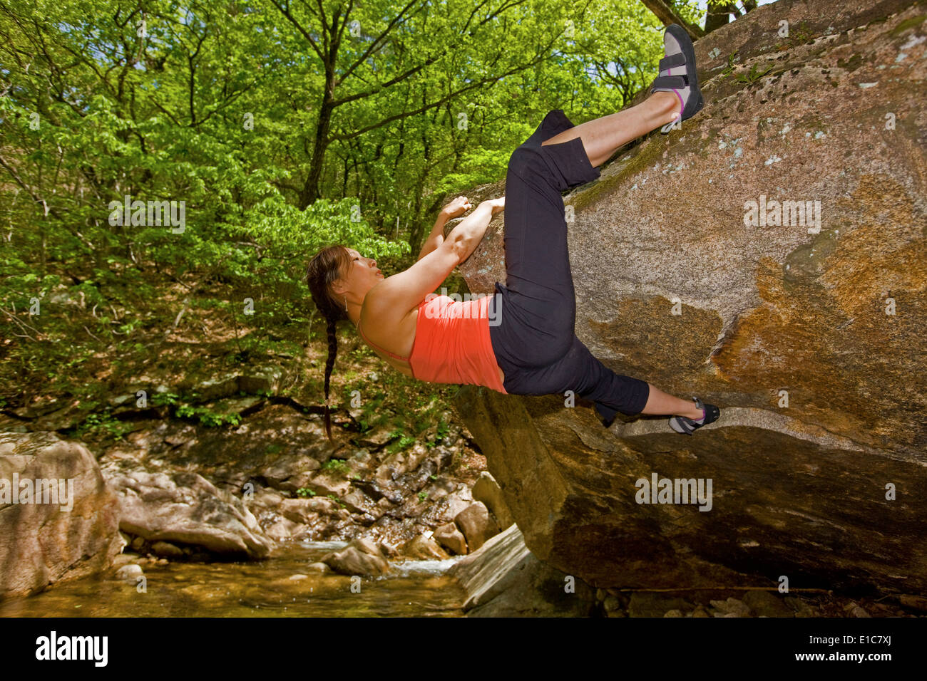 Female climber bouldering at Seoraksan National Park South Korea Stock
