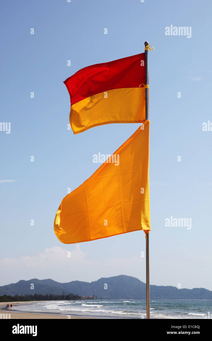 It's a photo of a yellow flag on the beach to indicate caution when