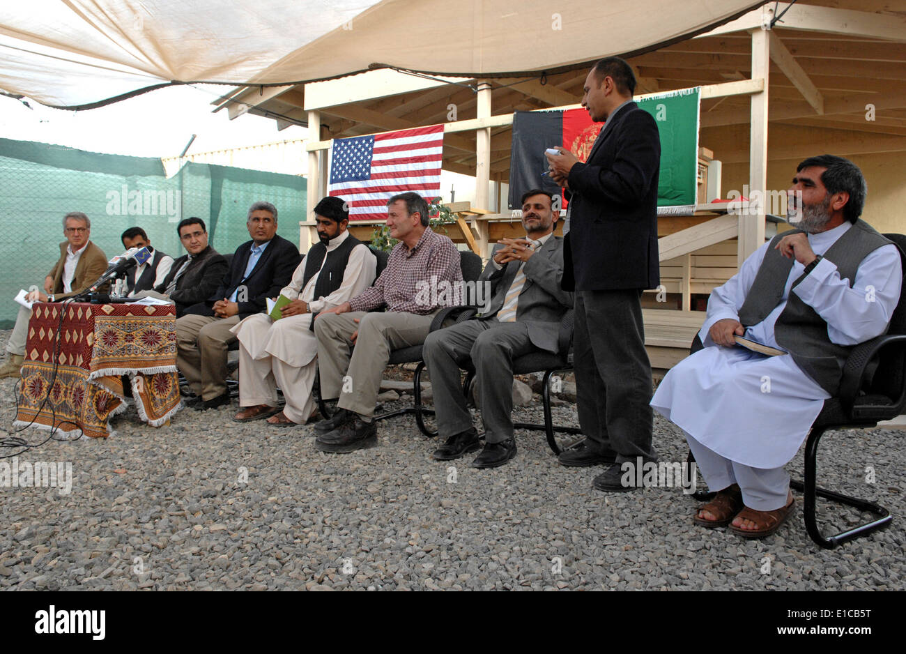 U.S. Ambassador Karl W. Eikenberry, along with Afghan Officials, holds a press conference at Forward Operating Base Salerno, Af Stock Photo