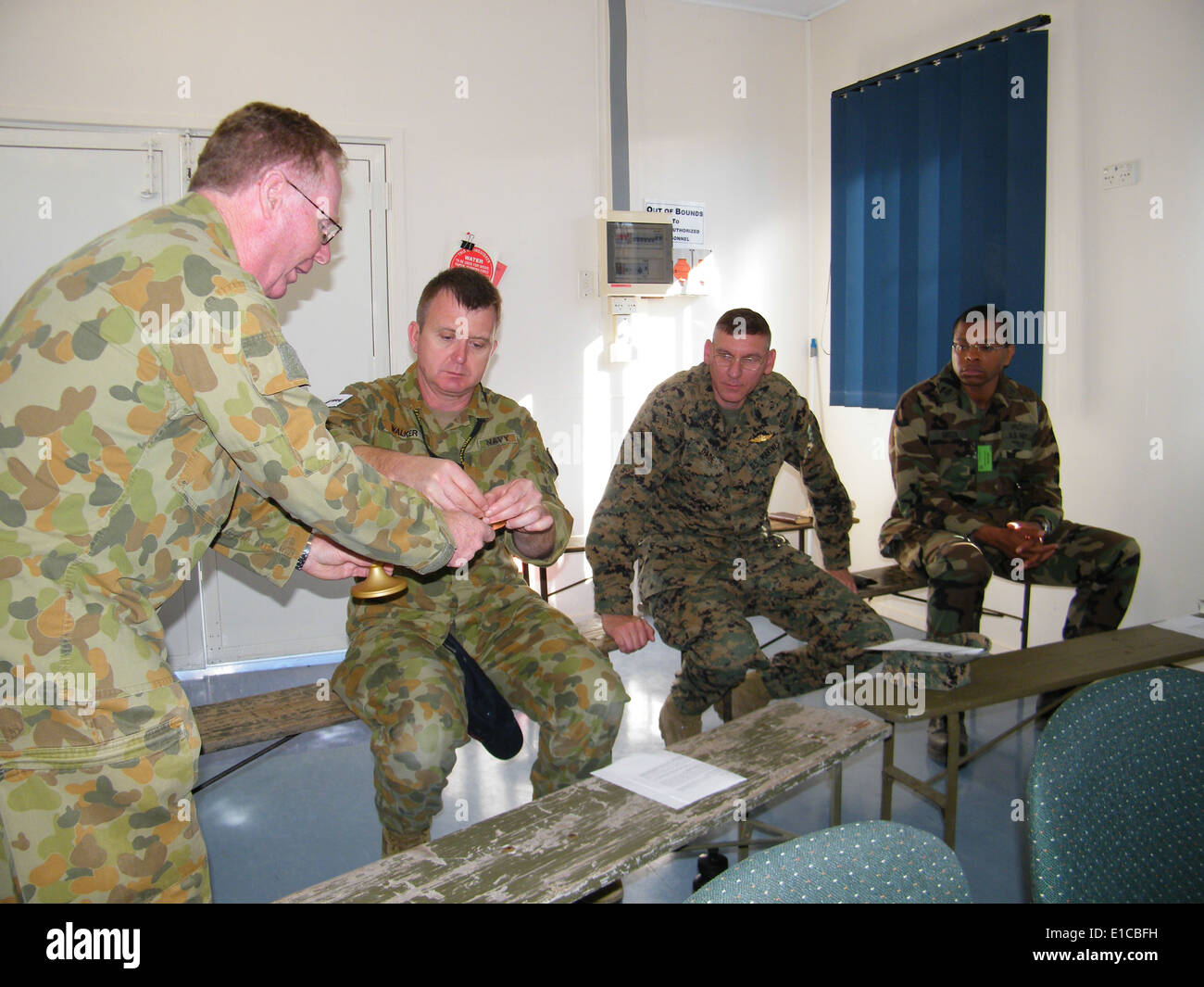 Australian army officer Rod McAuliffe, a chaplain with the 9 Force Support Battalion, 17th Combat Service Support Brigade, admi Stock Photo