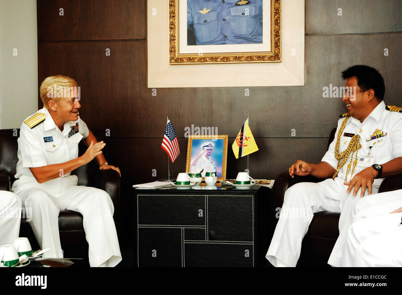 U.S. Navy Rear Adm. Nora Tyson, the commander of Logistics Group Western Pacific, talks with Commander Royal Brunei Navy Col. H Stock Photo